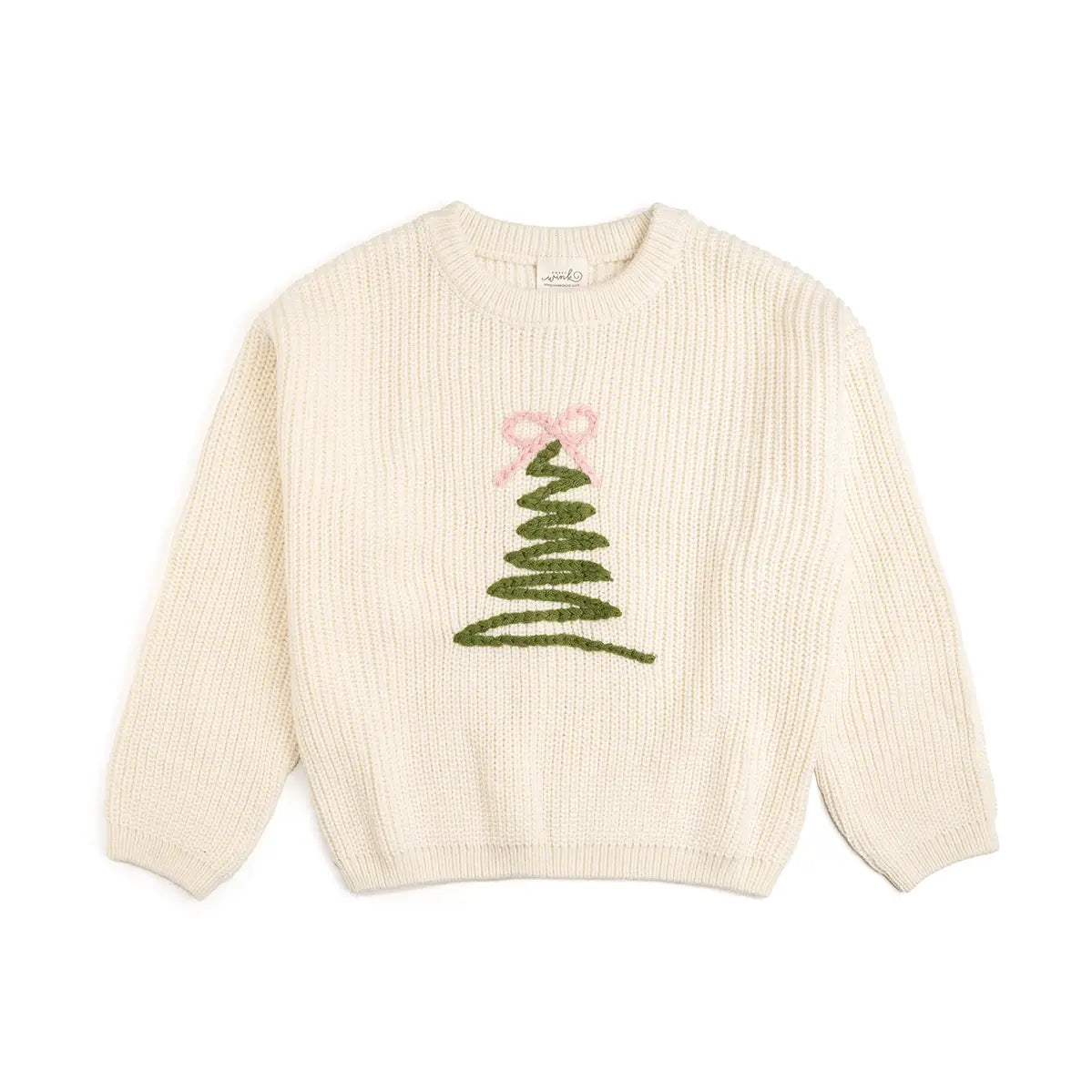 Kids cream sweater with knit green tree and pink bow details.
