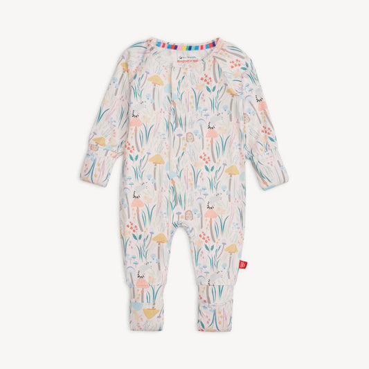 Baby onesie with floral and animal pattern with magnetic closure.