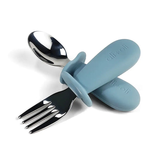Toddler fork and spoon set with anti-choke guards.